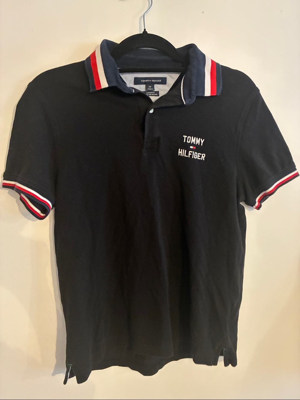 Tommy Hilfiger Men’s Black Polo with Red & White Stripe Trim